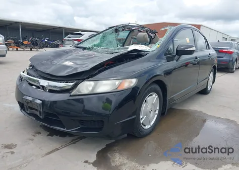 2010 Honda Civic Hybrid z USA, uszkodzony, nr VIN JHMFA3F26AS002535